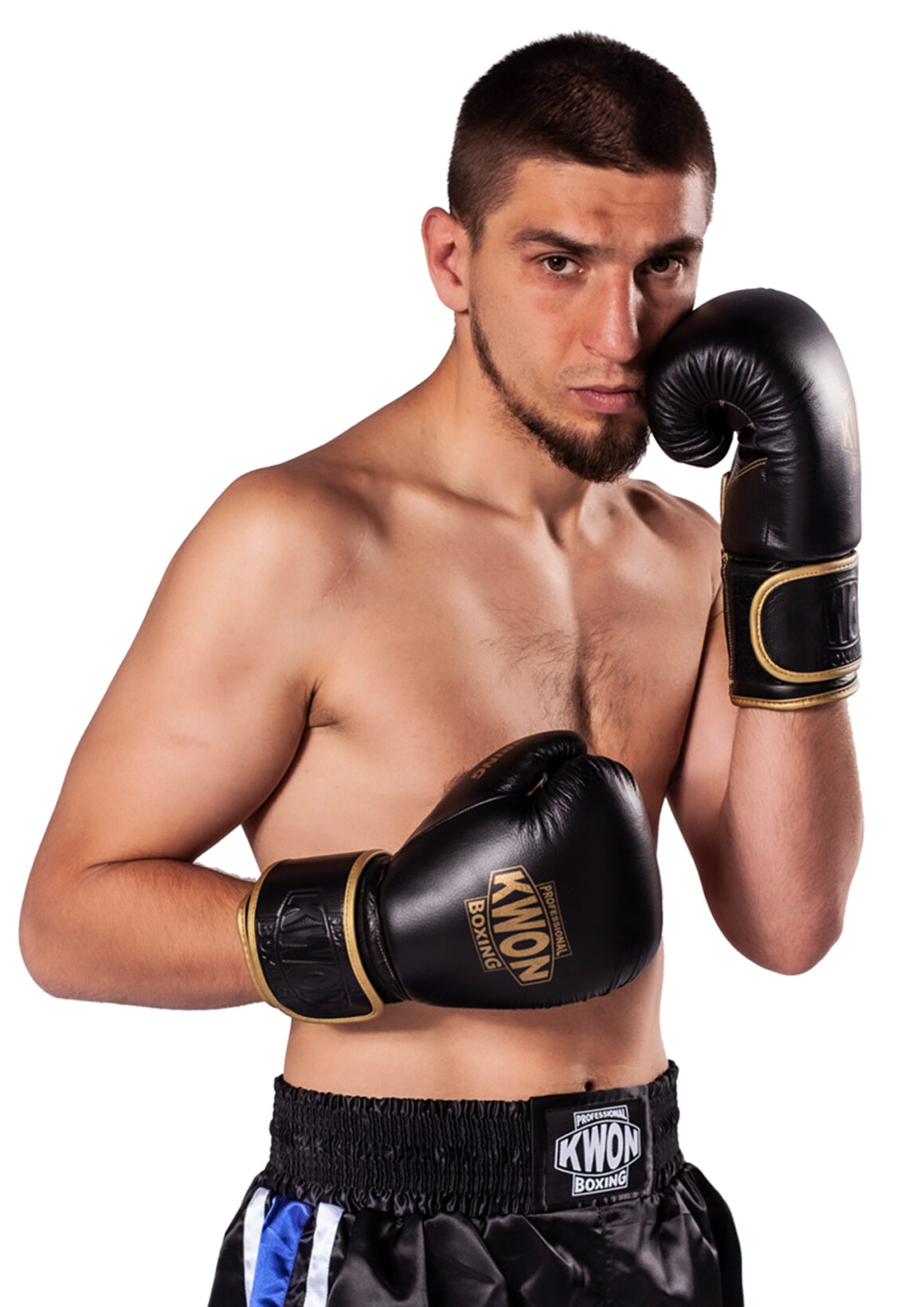 Kwon Professional Boxing Boxhandschuhe Sparring Defensiv schwarz-gold - Seitenansicht vorne Boxer in offensiv Stellung eine Faust oben und unten