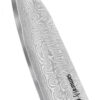 Samura Damascus 67 Santoku 7,0 Zoll, 175 mm Micarta Griff - Nahaufnahme Klinge zeigt nach links oben, auf einem weißen Hintergrund